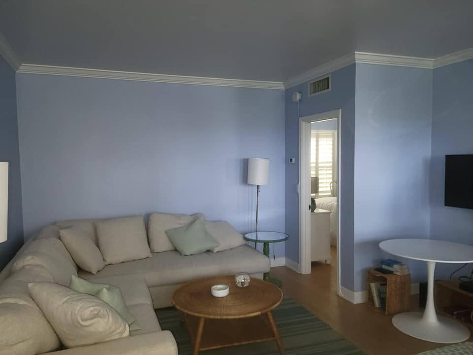 Living room painted in a soft coastal blue